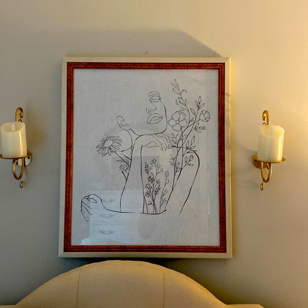Minimalist artwork with sconces